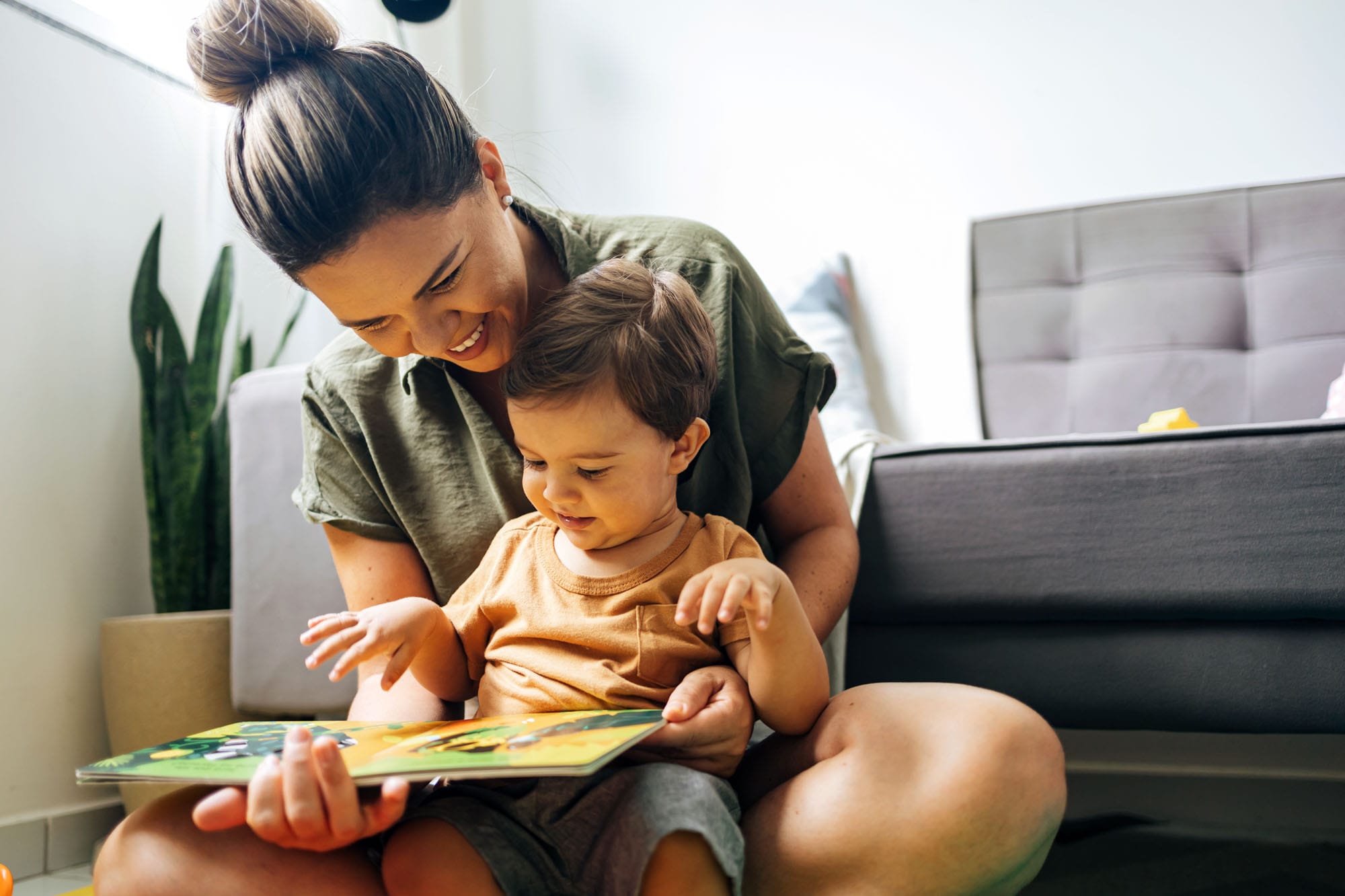 Parent and child enjoying a book together